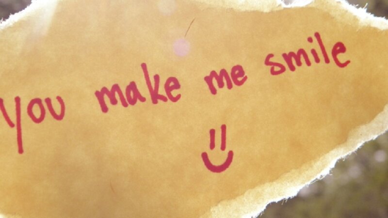 note with smiley face