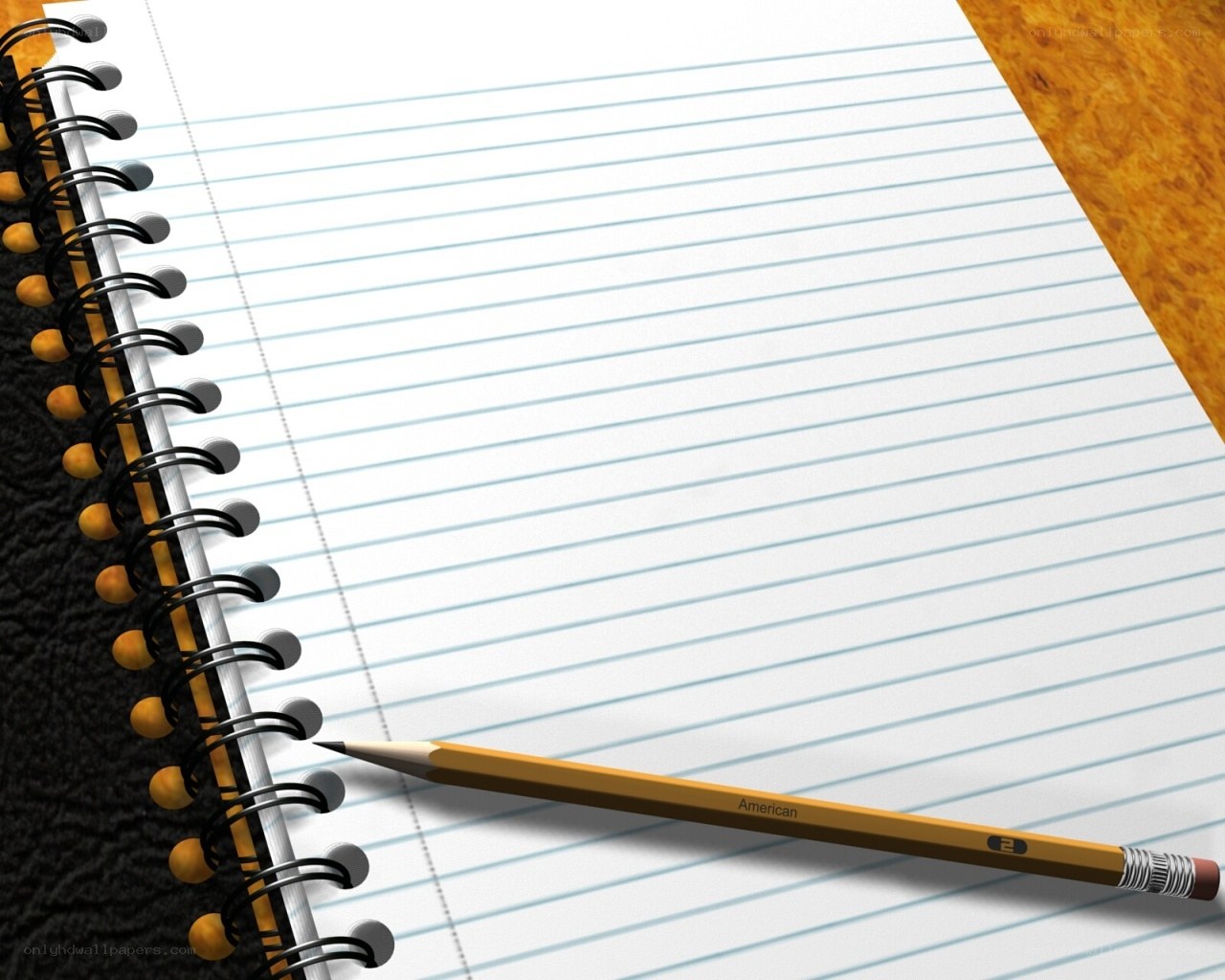 notebook and pencil on desk