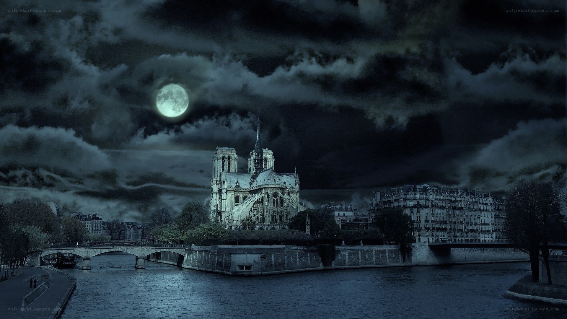 Notre-Dame at night under a full moon