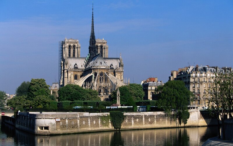 Notre-Dame Cathedral — Blue, Serene, Afternoon, Photograph, River, Trees, Buildings