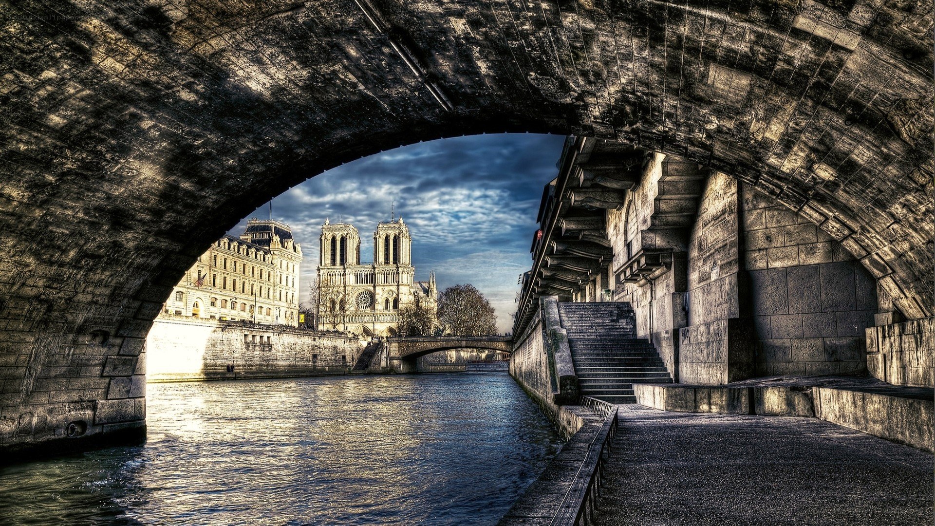 Notre-Dame viewed from under a bridge