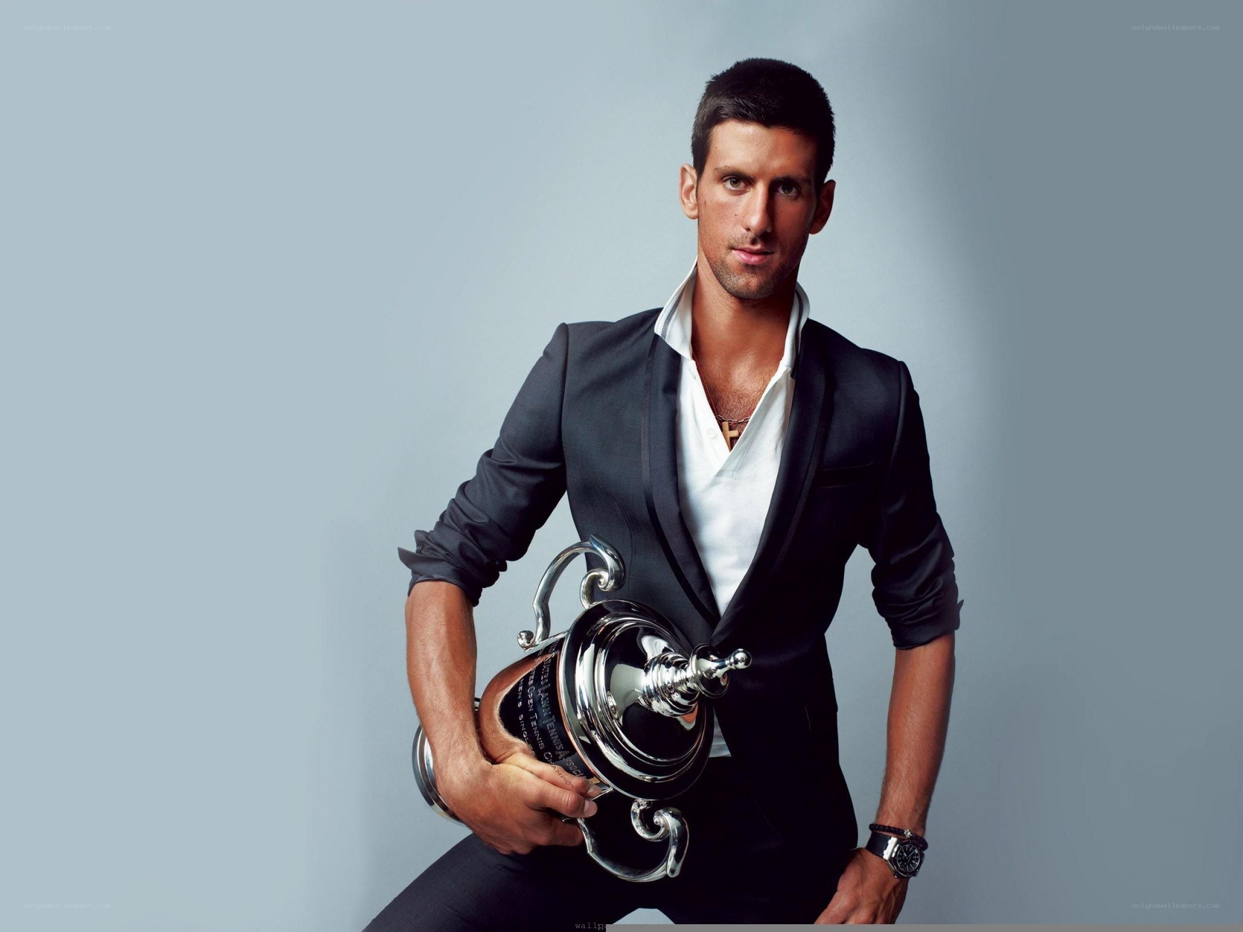 Novak Djokovic holding trophy