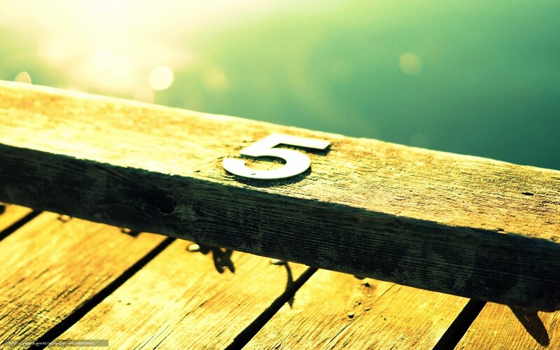Number five on wooden dock