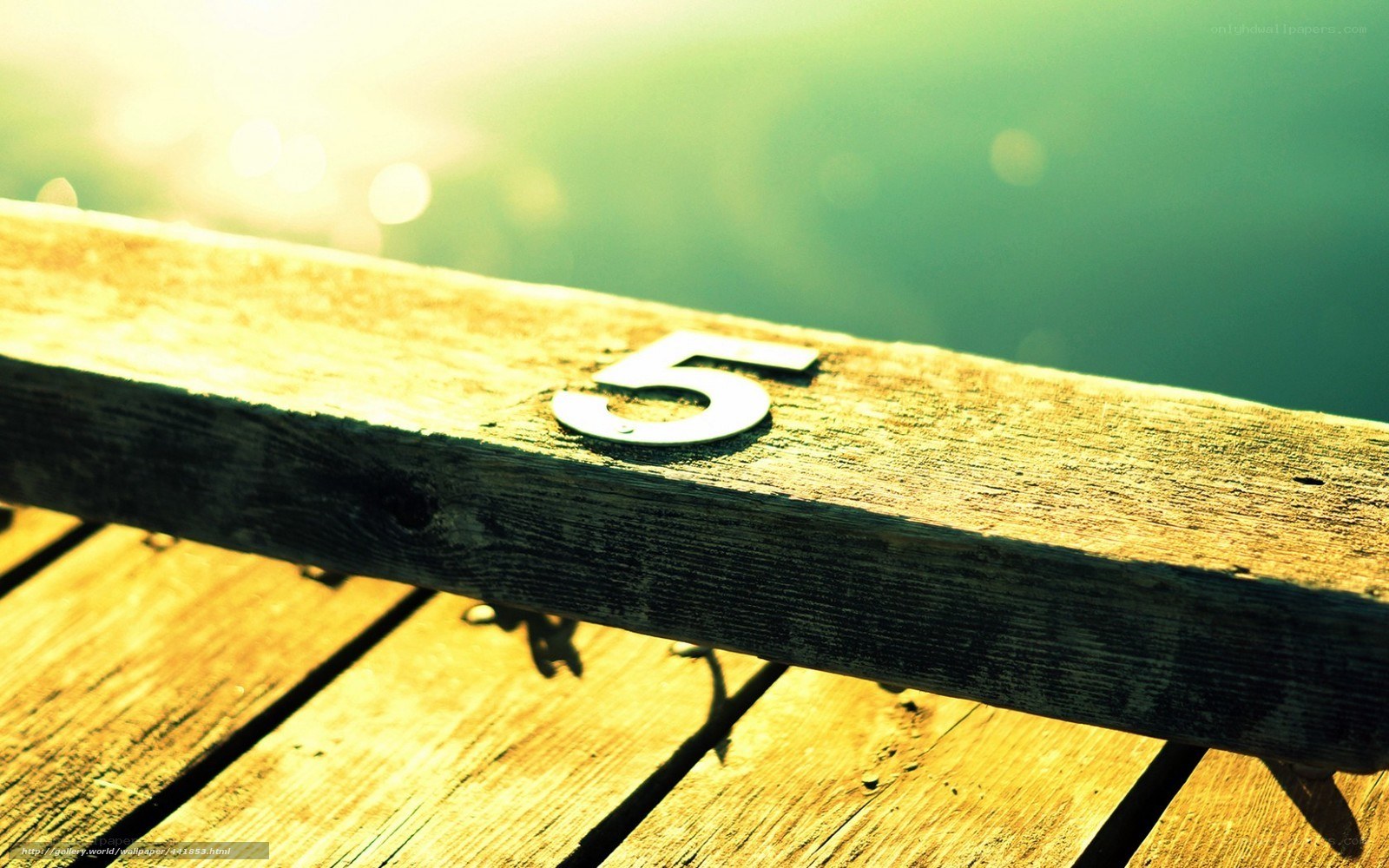 Number five on wooden dock