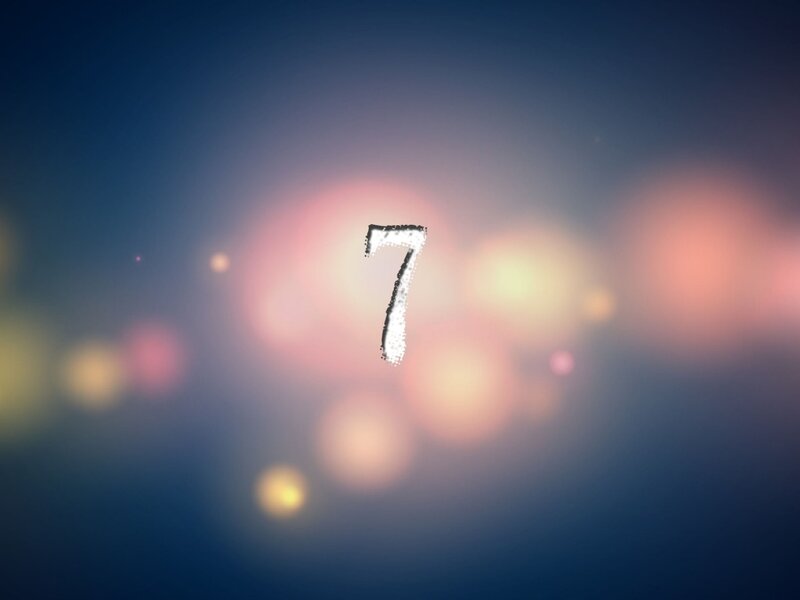 Number seven on bokeh background