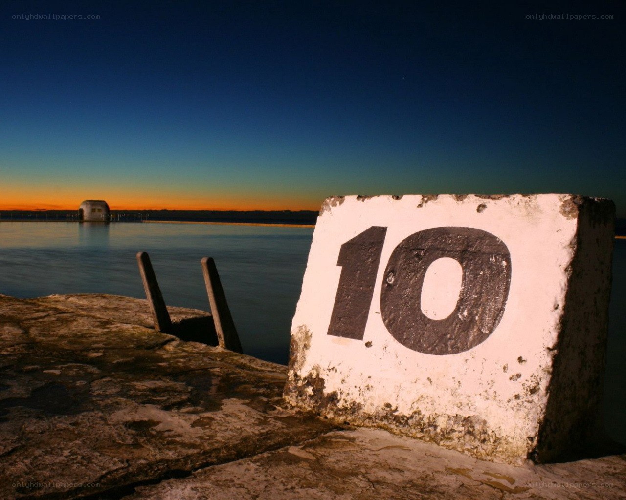 Number ten marker at sunset