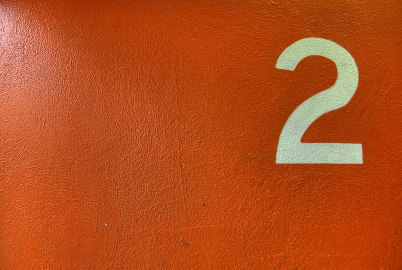 number two on orange wall