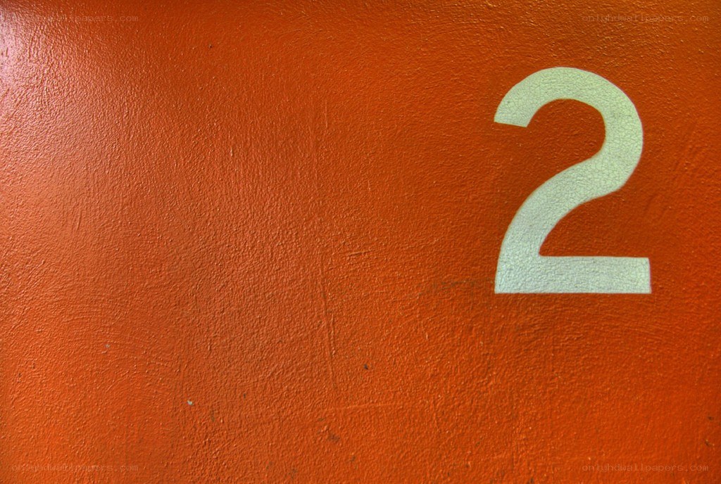 number two on orange wall