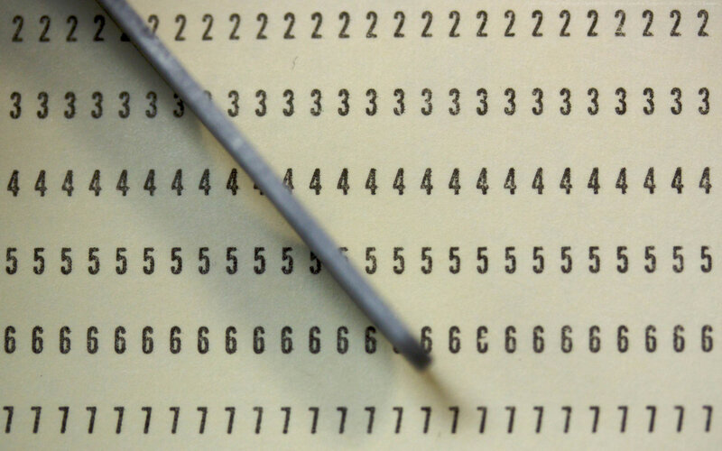 numbered paper with pen