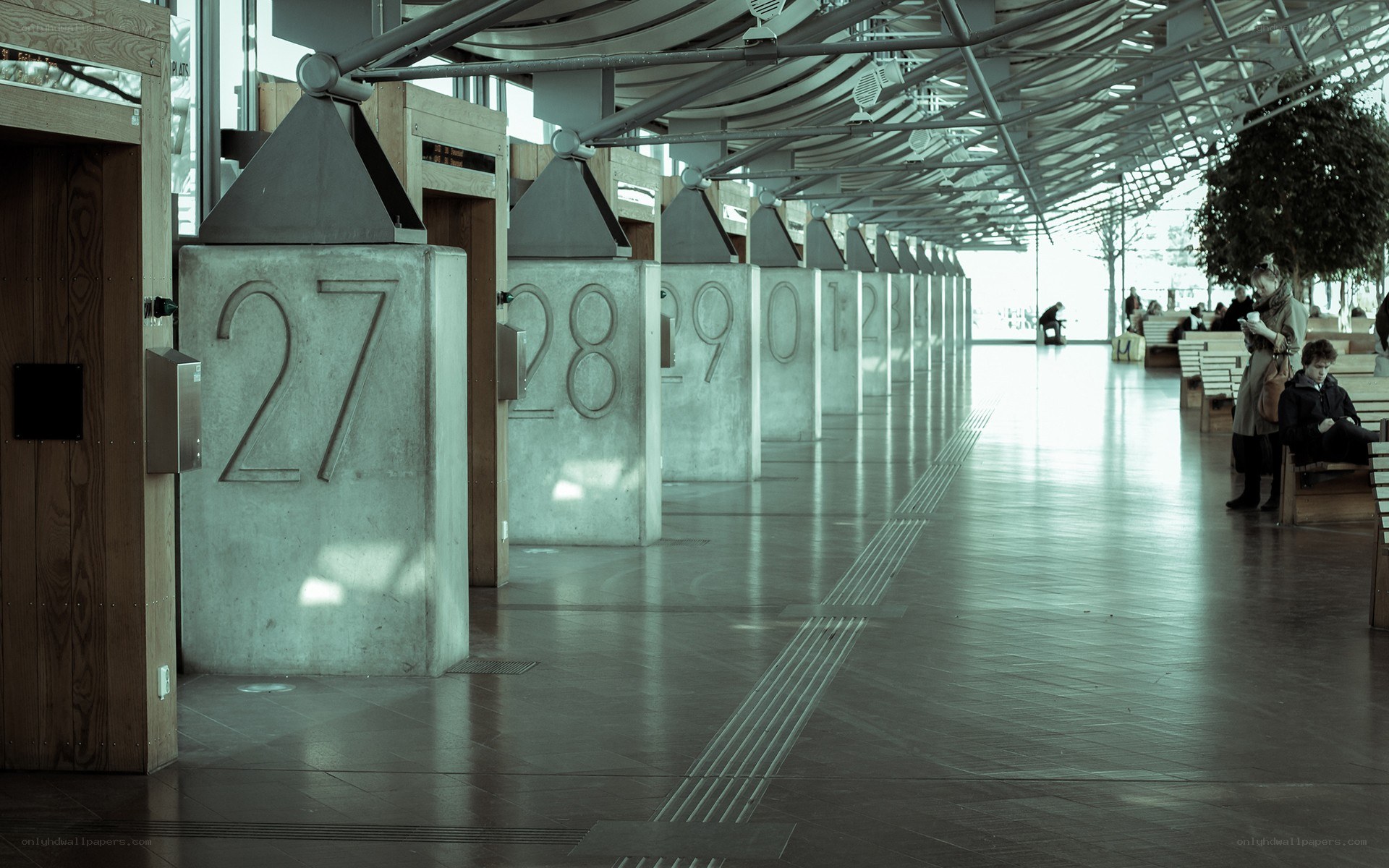 Numbered pillars in a modern hall