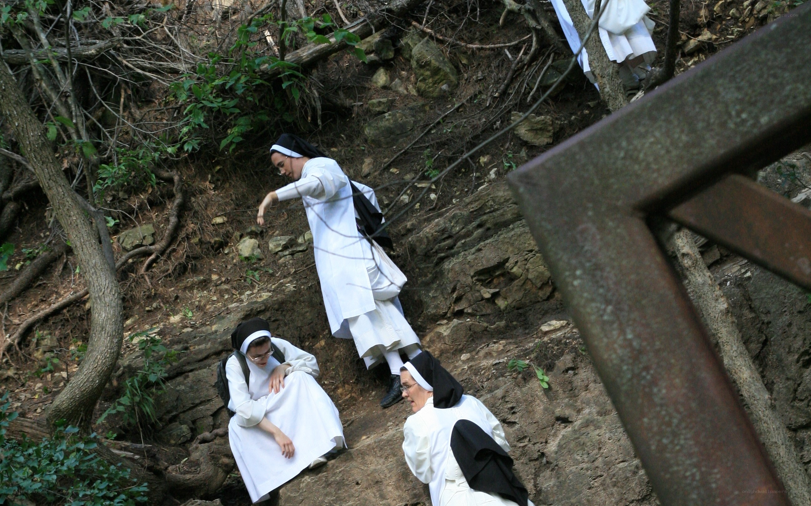 Nuns on a rocky hillside