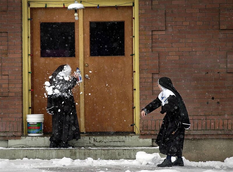 Nuns play in snow