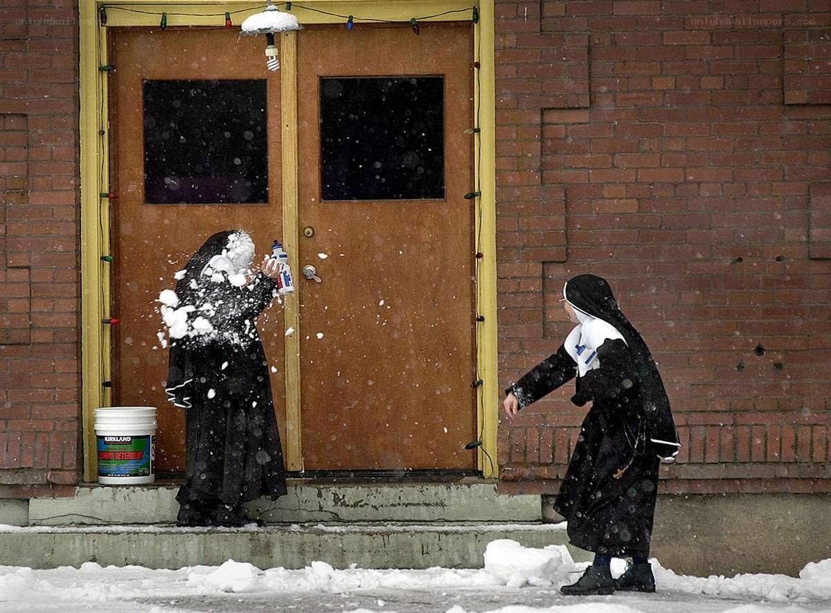 Nuns play in snow