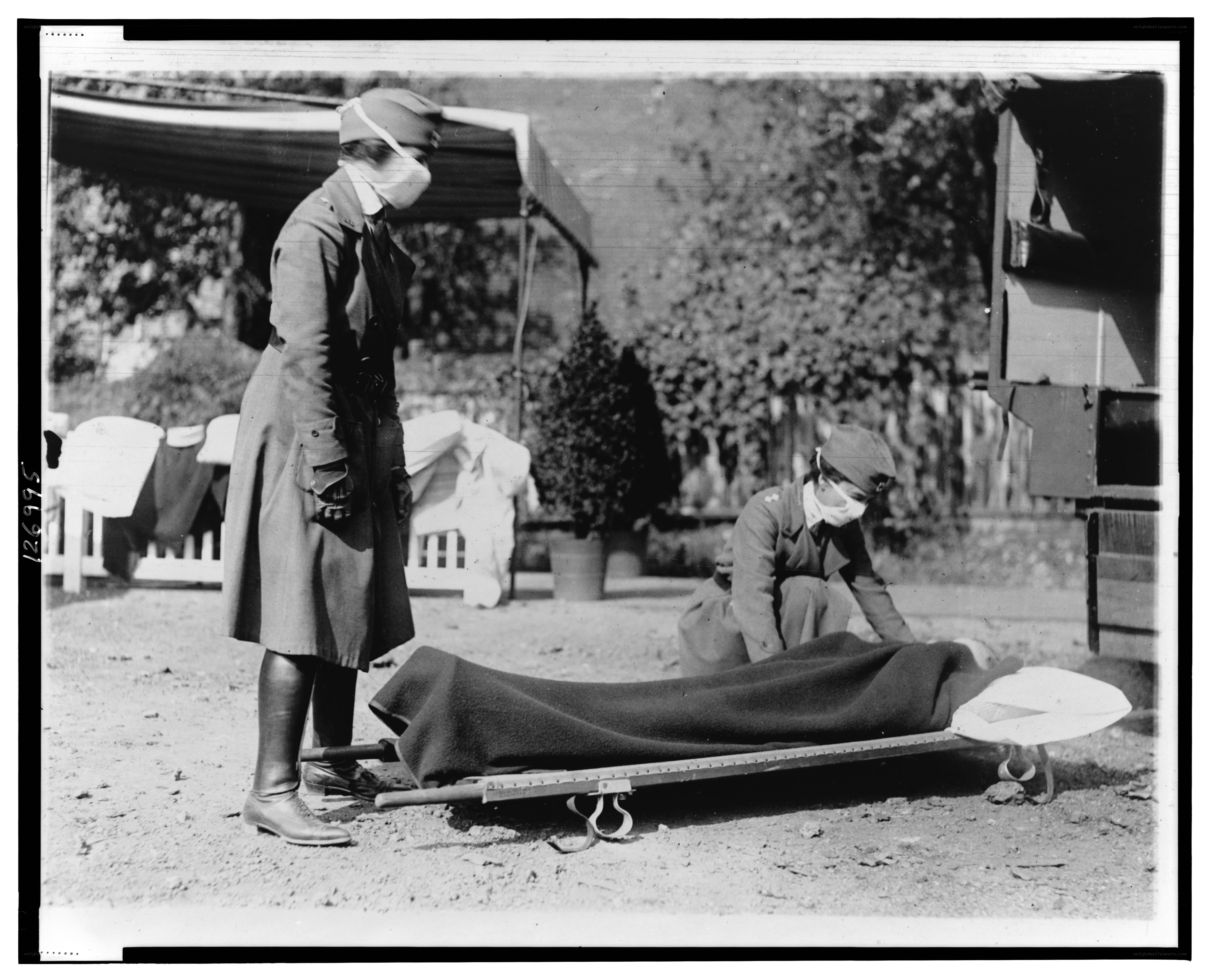 Nurses with patient on stretcher