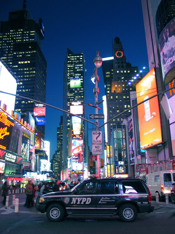 NYPD car in Times Square at night
