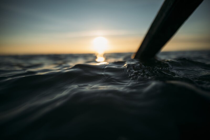 Oar in Water at Sunset — Blue