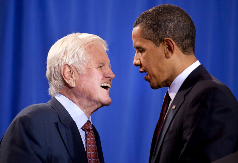 Obama and Biden laughing together