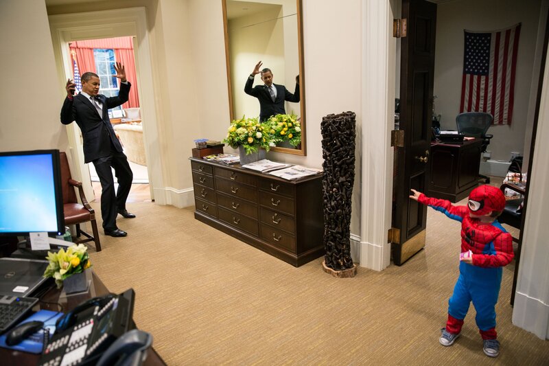 Obama and child in Spider-Man costume
