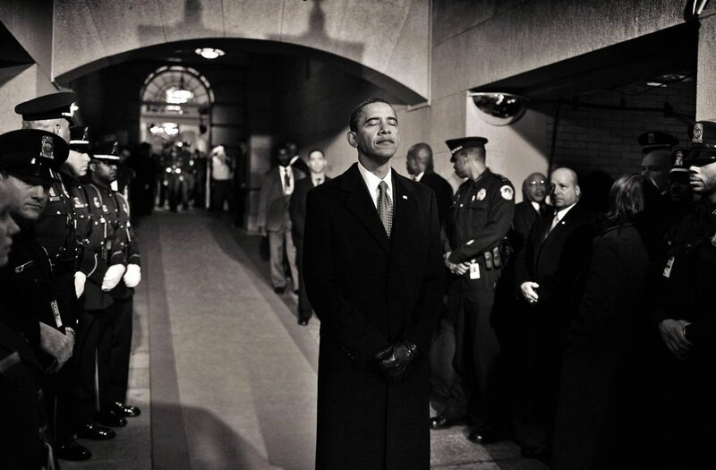 Obama in a hallway with police