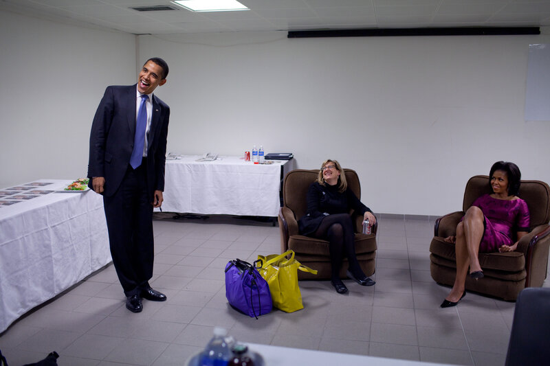 Obama laughing with two women