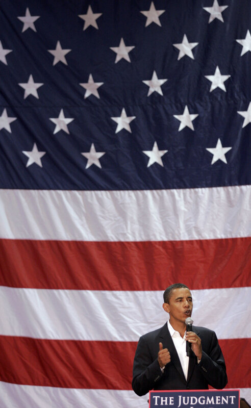 Obama speaking at podium