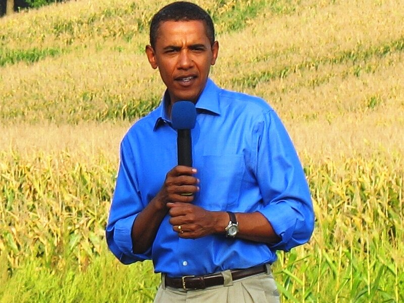 Obama speaking in a field