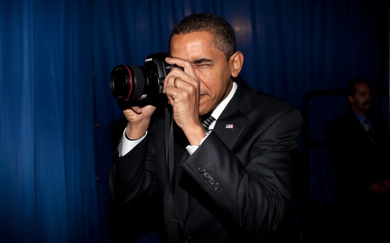 Obama taking a photo