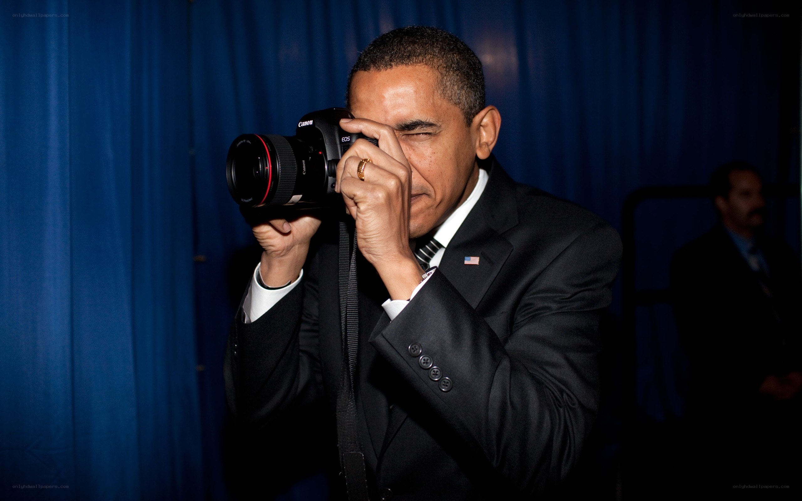 Obama taking a photo