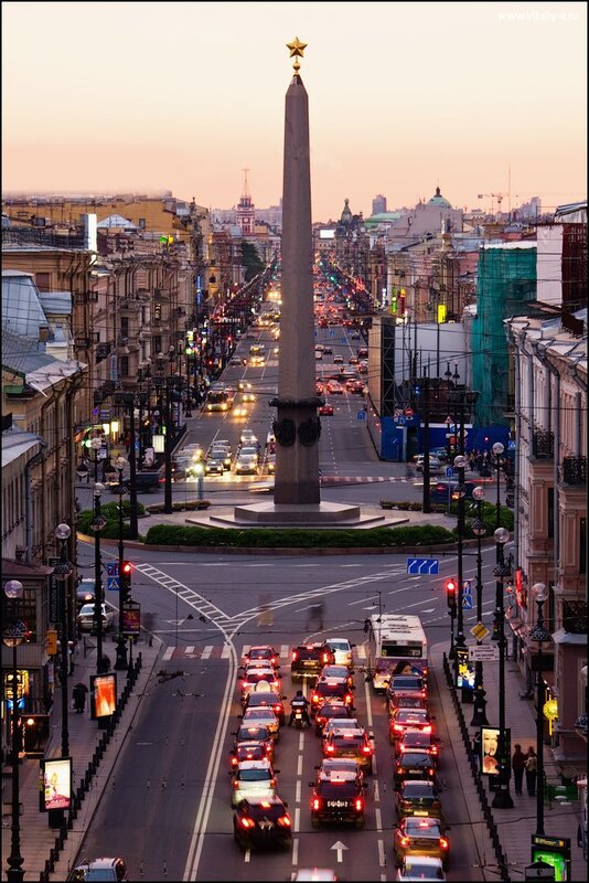 Obelisk at sunset in city