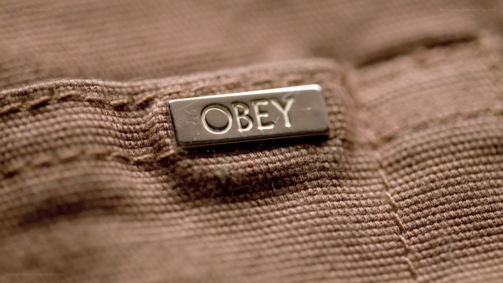Obey brand tag on fabric