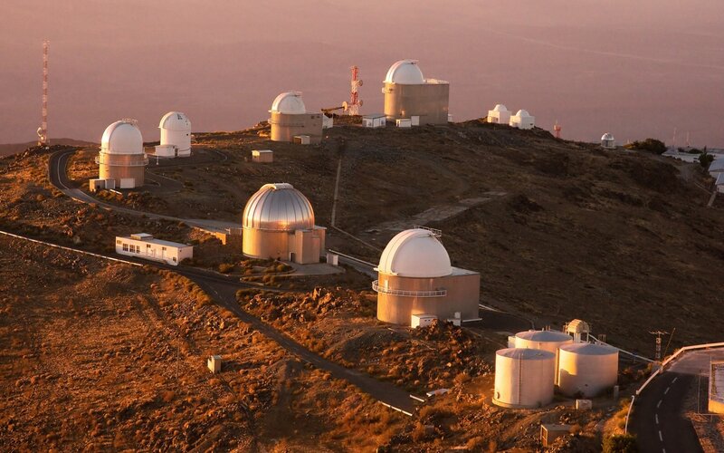 Observatory Domes on Hill — Brown