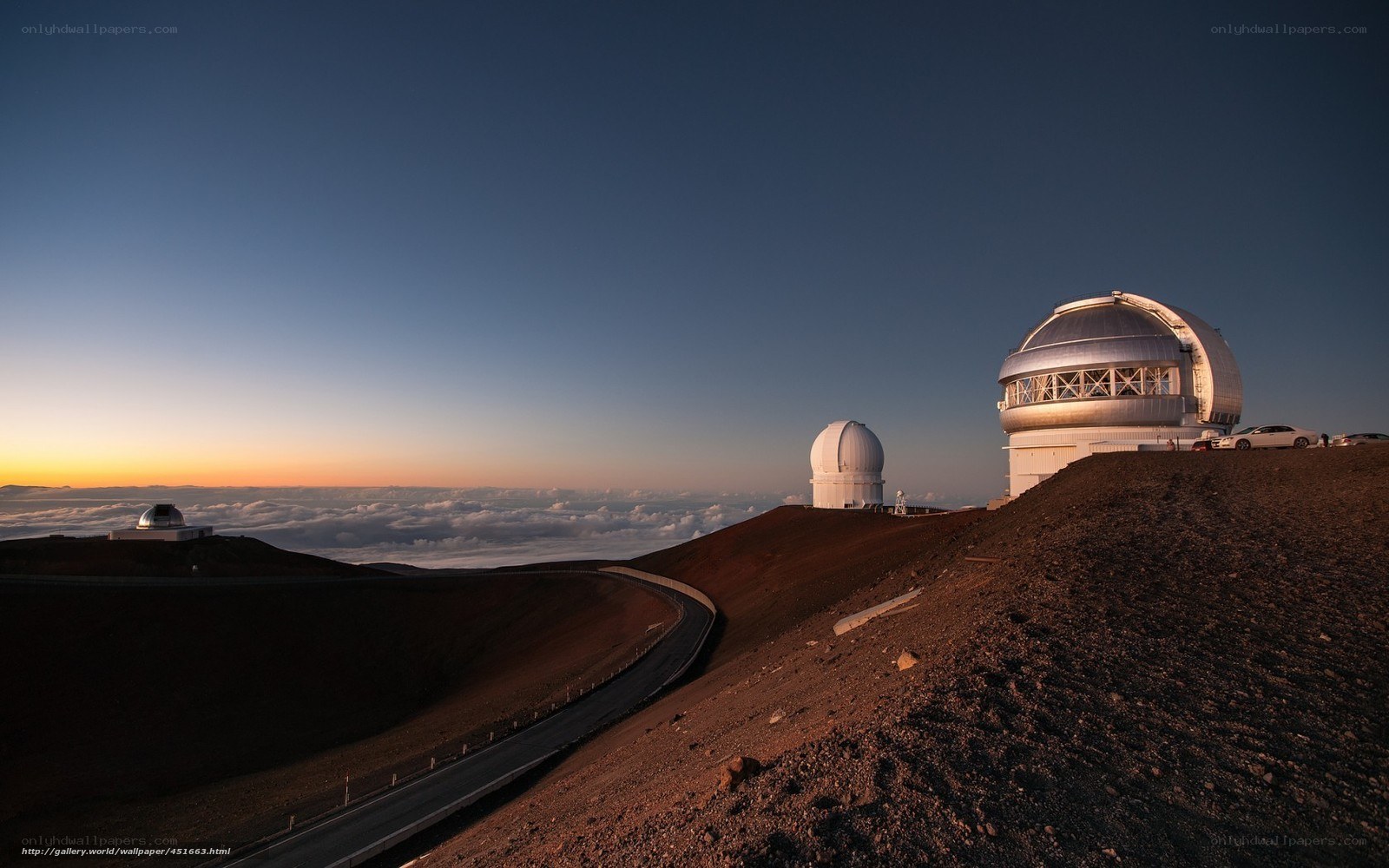 Observatory on a mountain at sunset