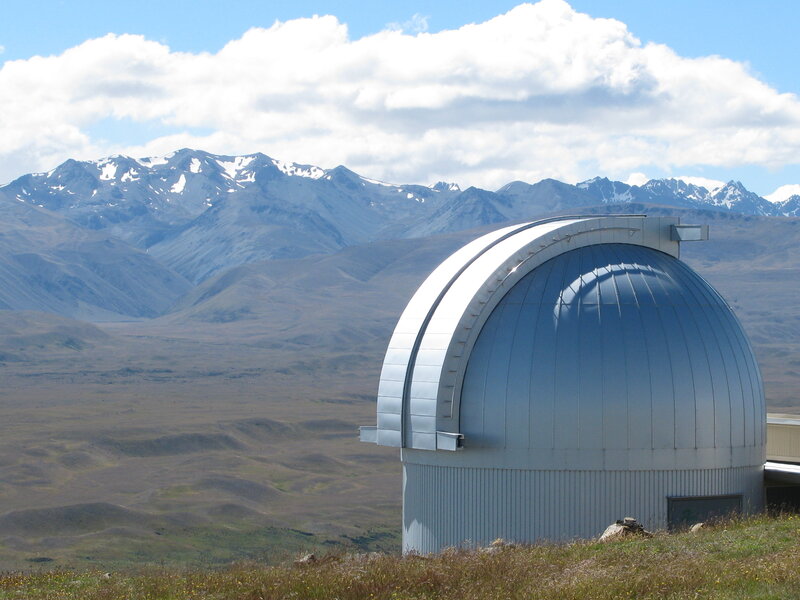 Observatory with mountain backdrop