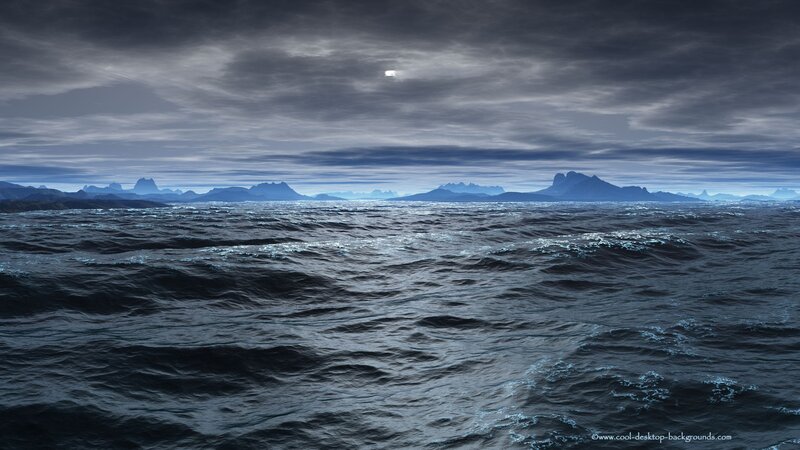 Ocean at dusk with distant mountains