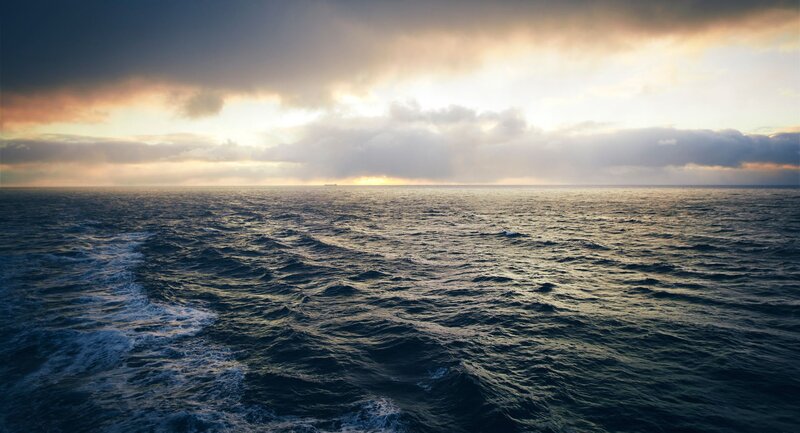 Ocean at Sunset — Blue, Dramatic, Photograph, Clouds, Sunlight