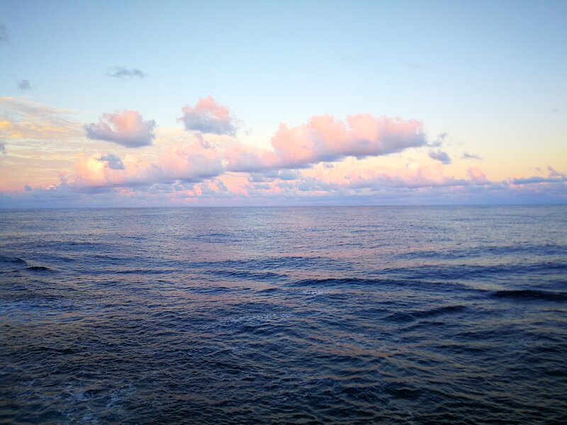 Ocean at Sunset — Blue, Serene, Photograph, Clouds