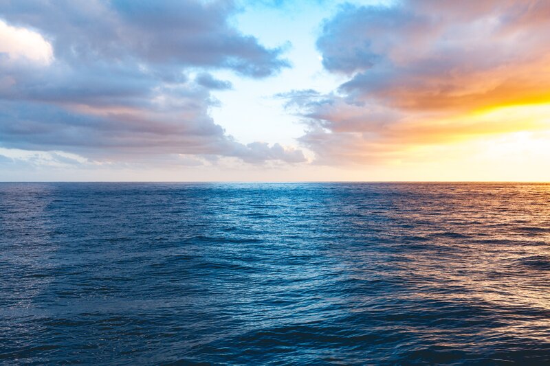 Ocean at Sunset — Blue, Serene, Photograph, Sky, Clouds, Sun