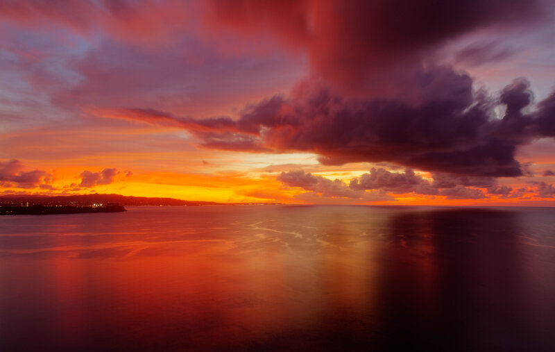 Ocean at Sunset — Orange, Dramatic, Photograph, Sky, Clouds, City Lights