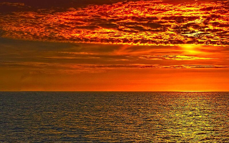 Ocean at Sunset — Orange, Dramatic, Photograph, Sky, Clouds, Sun, Yellow