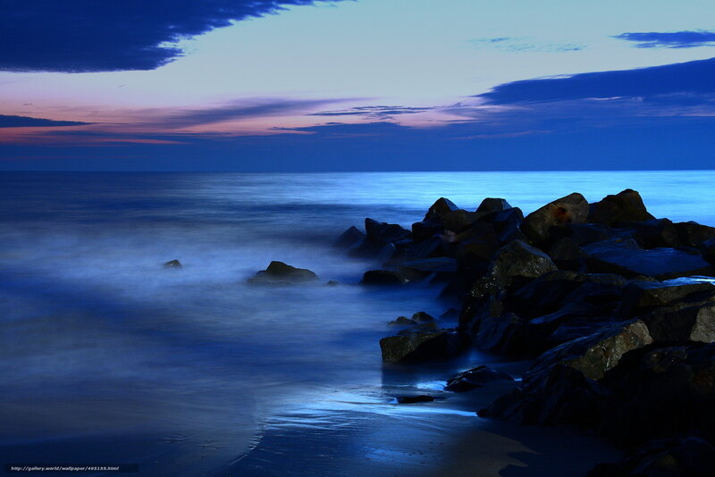 Ocean at twilight with rocks