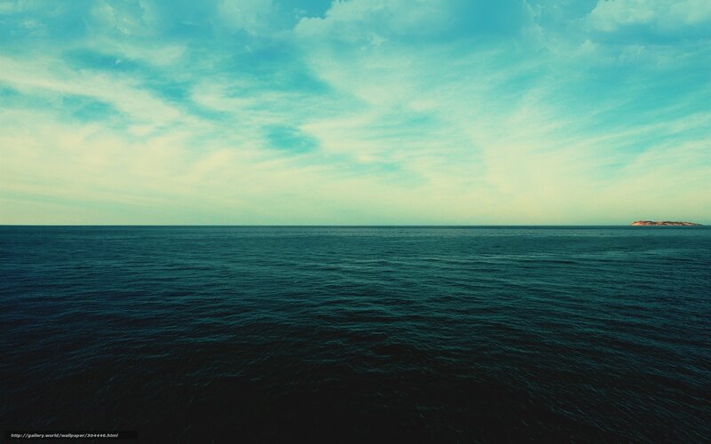 Ocean horizon with distant island