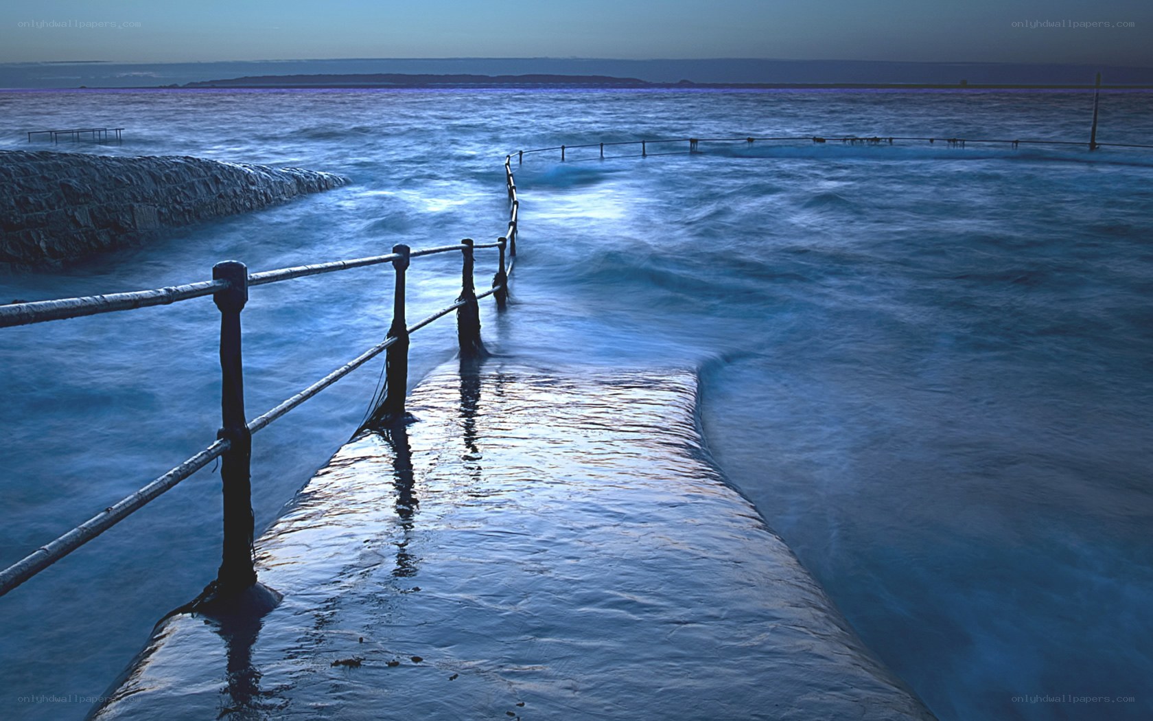Ocean pier at twilight