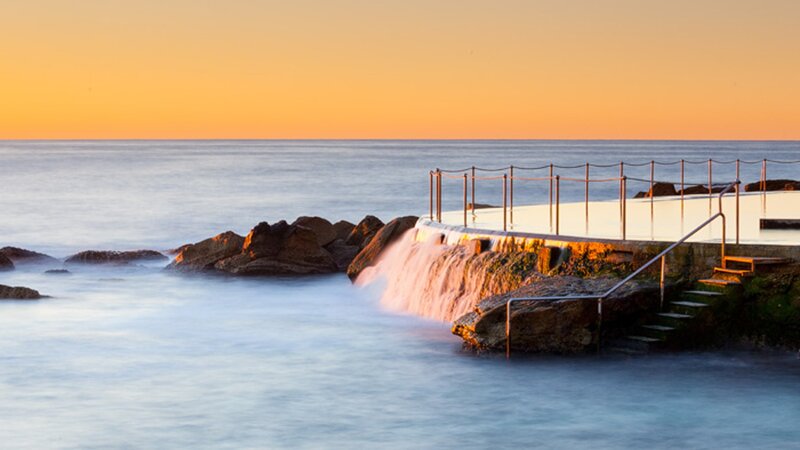 Ocean Pool at Sunset — Orange, Serene, Photograph, Rocks, Stairs