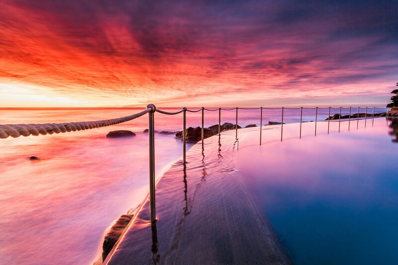 Ocean Pool at Sunset — Red, Dramatic, Photograph, Rope Railing