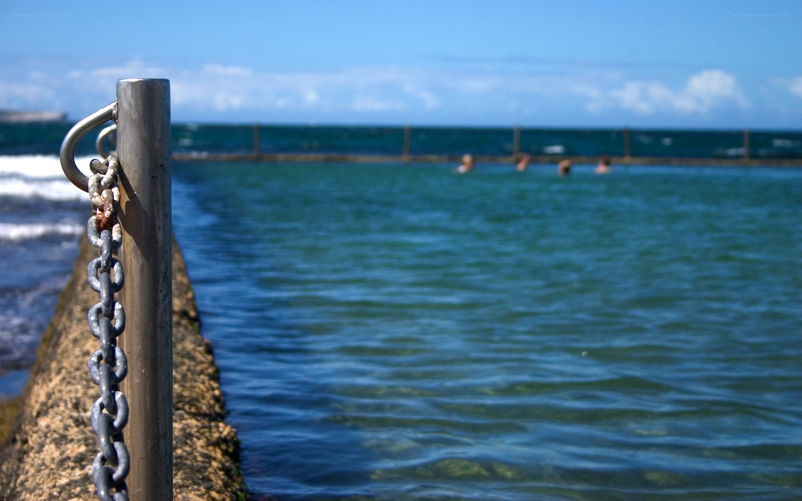 Ocean pool with swimmers