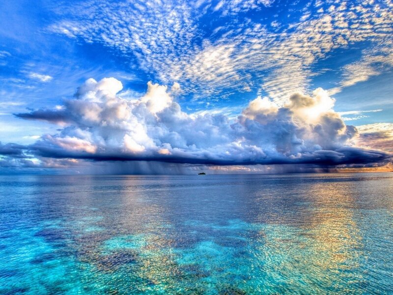 Ocean storm with rain and clouds