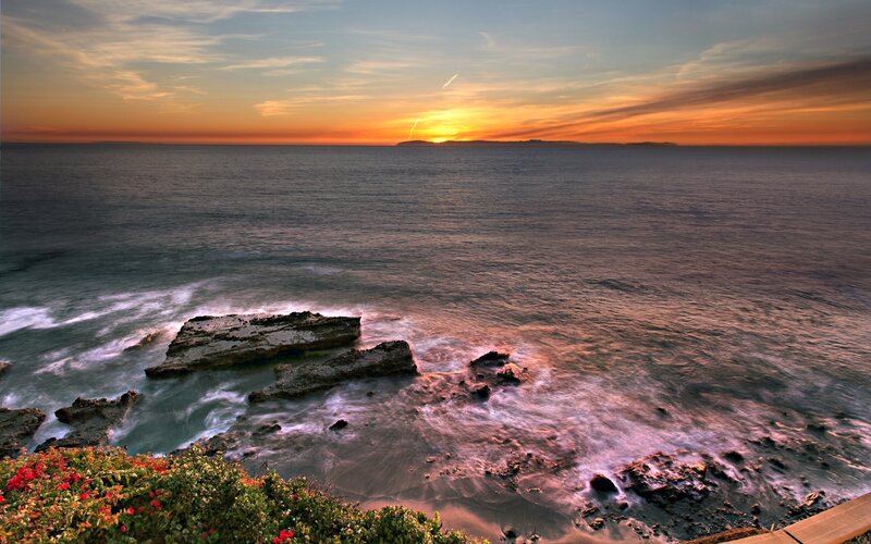 Ocean Sunset over Rocks — Orange