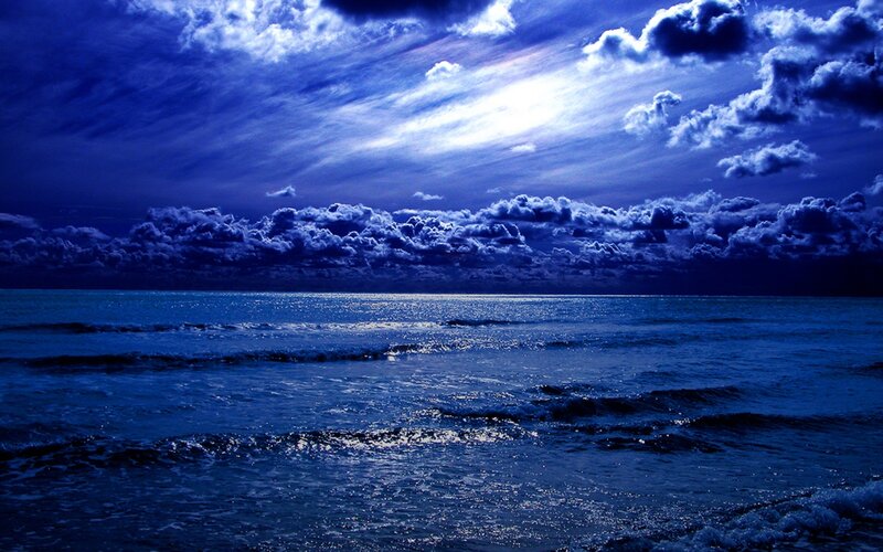 Ocean under Cloudy Sky — Blue, Dramatic, Night, Photograph