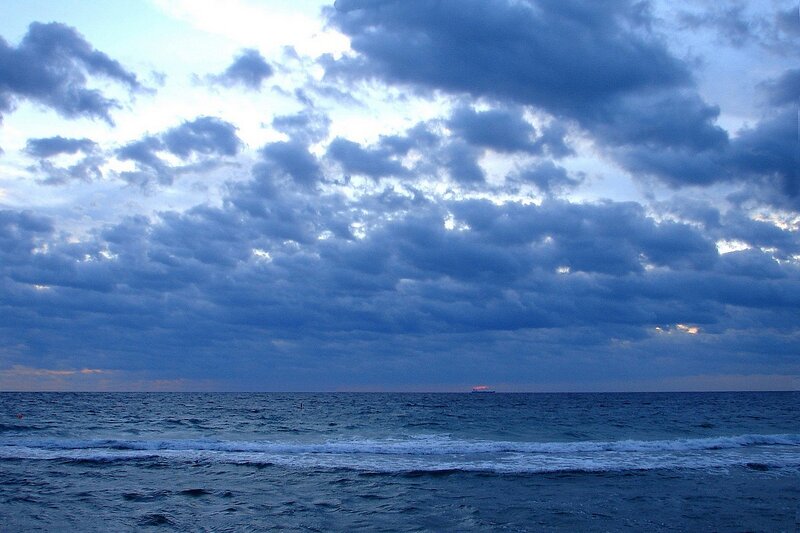 Ocean under Cloudy Sky — Blue, Dramatic, Sunset, Photograph, Clouds, Waves