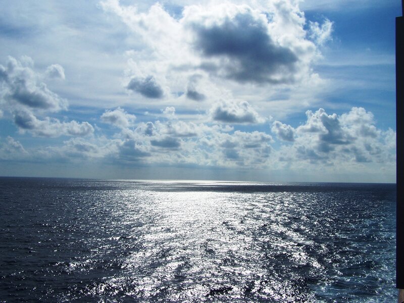 Ocean under Cloudy Sky — Blue, Serene, Afternoon